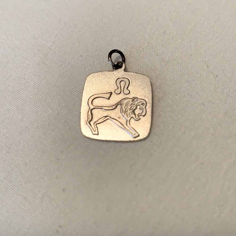 Leo charm for necklace or bracelet. Perfect for those August birthdays!
